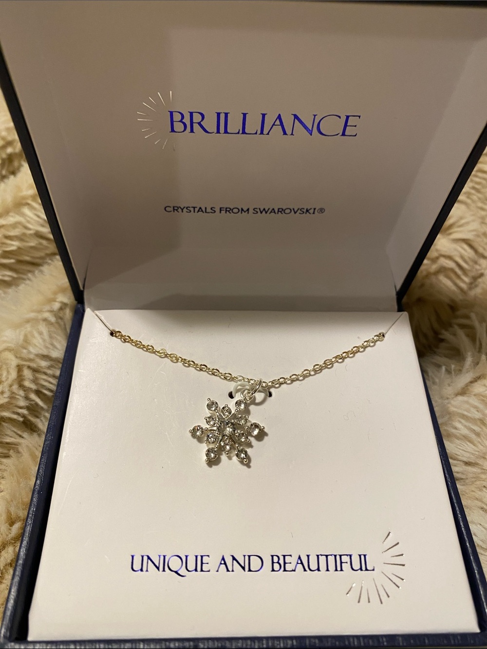 Silver plated Swarovski Crystal snow flake necklace. Brand new. Never worn.